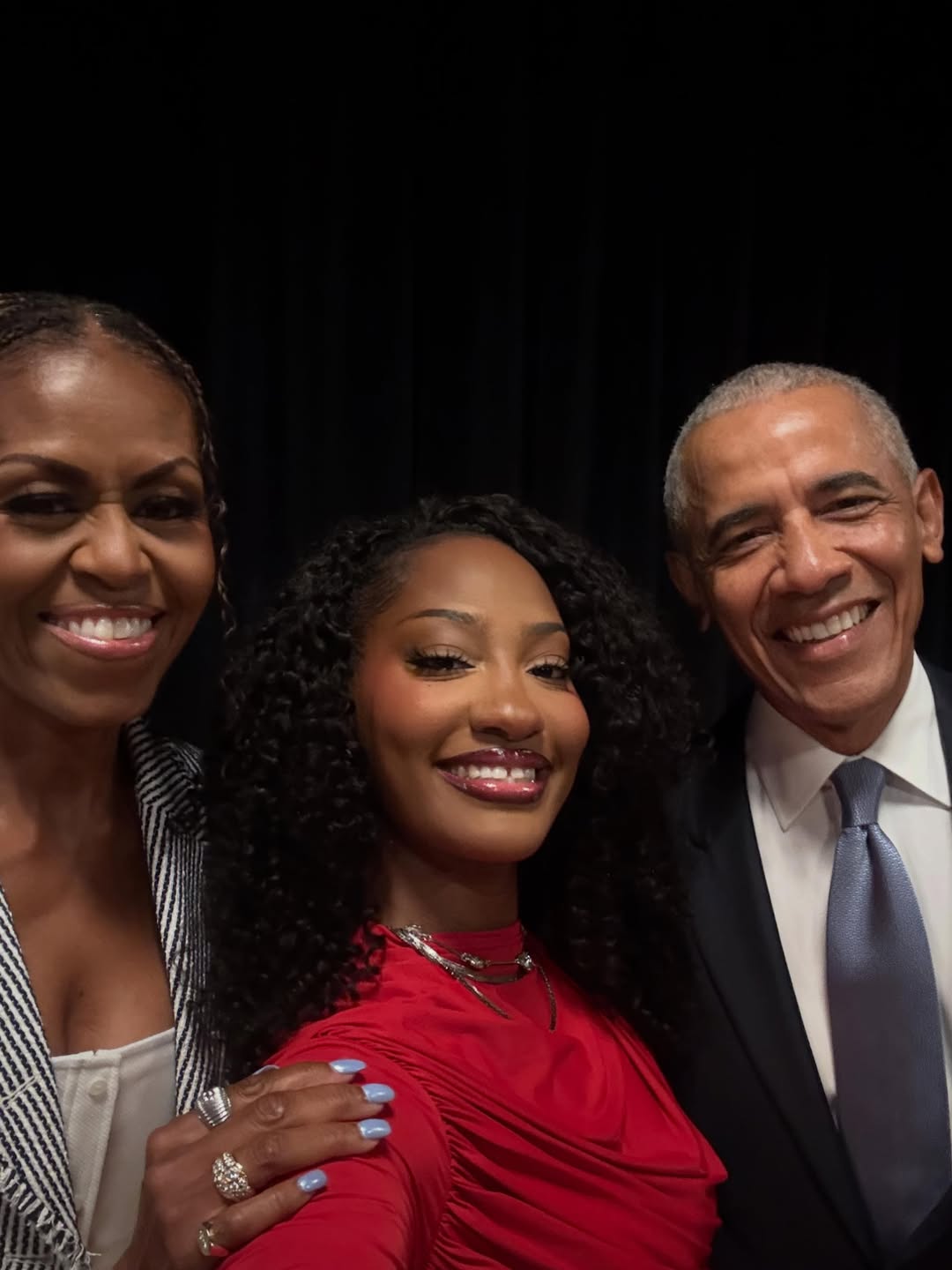 Watch Tems Perform “Me & U” in a Stunning Crimson Gown at the Obama Presidential Center Grand Opening
